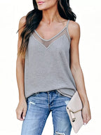 Plus size V-neck cami top from Trendsi, full size, lightweight and stylish blouse with a V-neck neckline, shown on a model.