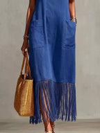 Plus size fringe V-neck spaghetti strap dress by Shopimist, full-length with flowing fabric and stylish fringe details.