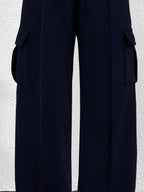 Women's high-waisted casual cargo pants with drawstring, lightweight utility style, featuring multiple pockets and relaxed fit.