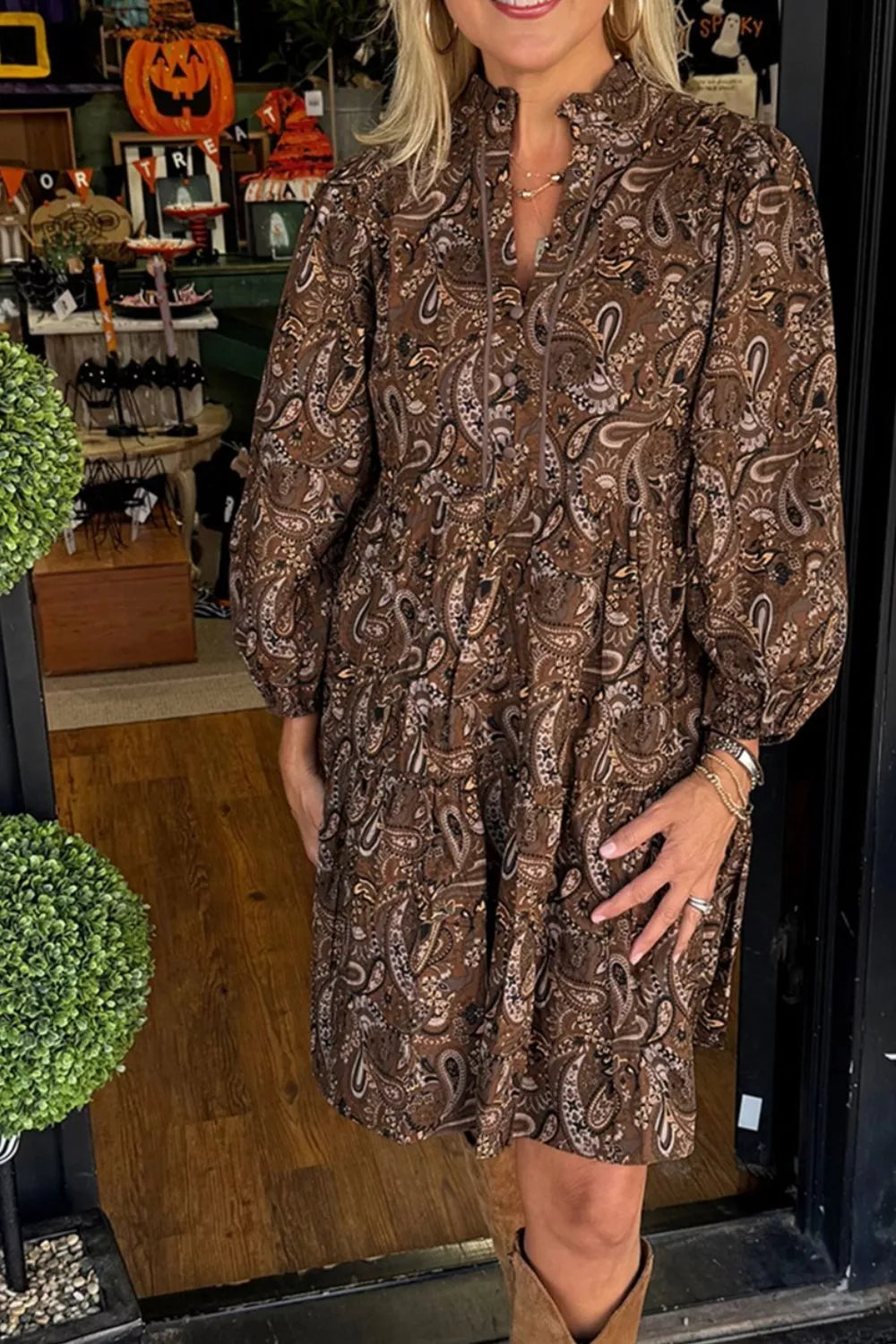 Paisley print notched mini dress by Plush Fashion Hub, featuring a stylish design with a notched neckline and vibrant pattern.