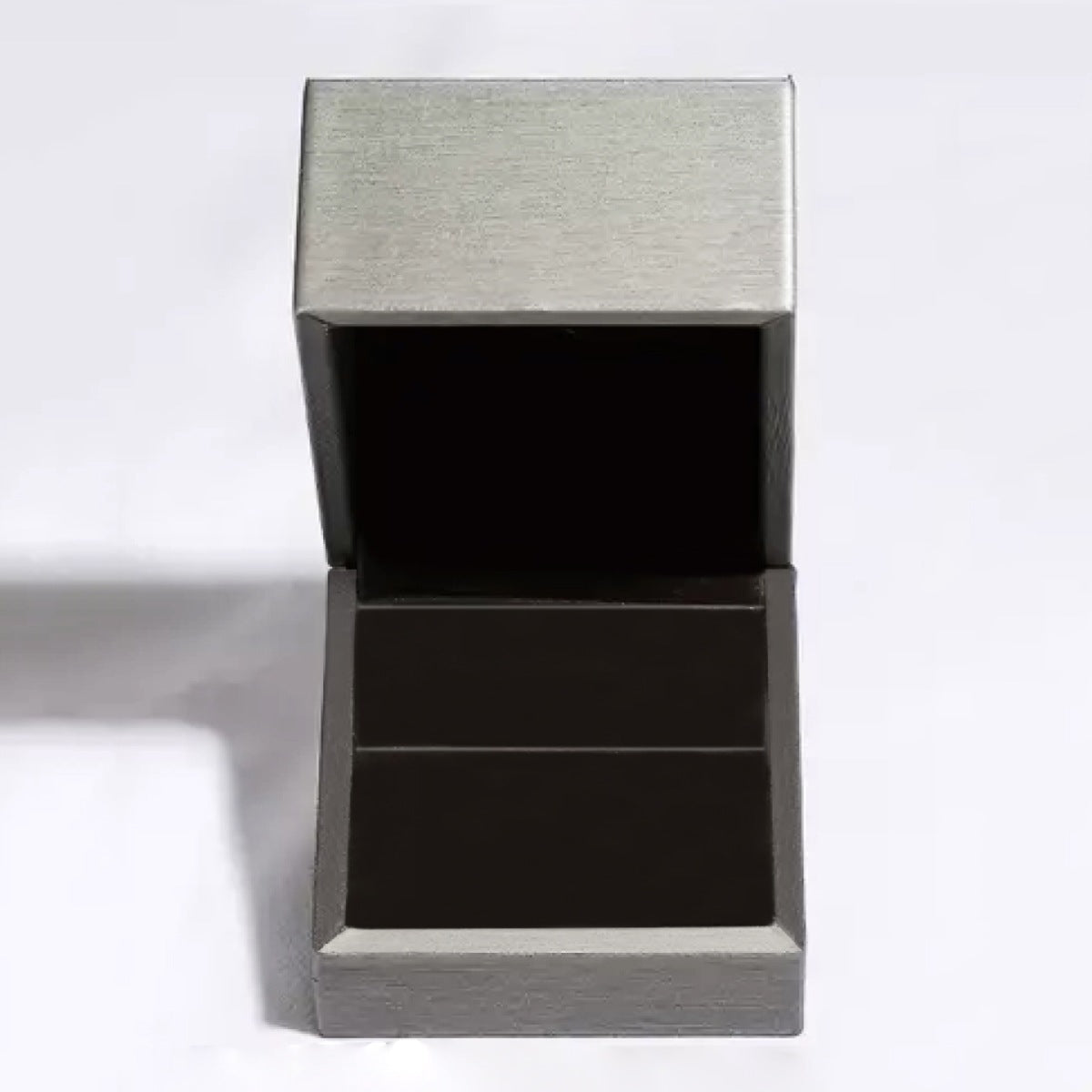 Sterling silver ring with 1.5 carat moissanite gemstone, featuring a sleek and elegant design.