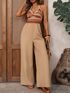 Chic Trendsi women's halter neck wide leg jumpsuit with elegant design, perfect for evening wear and stylish occasions.