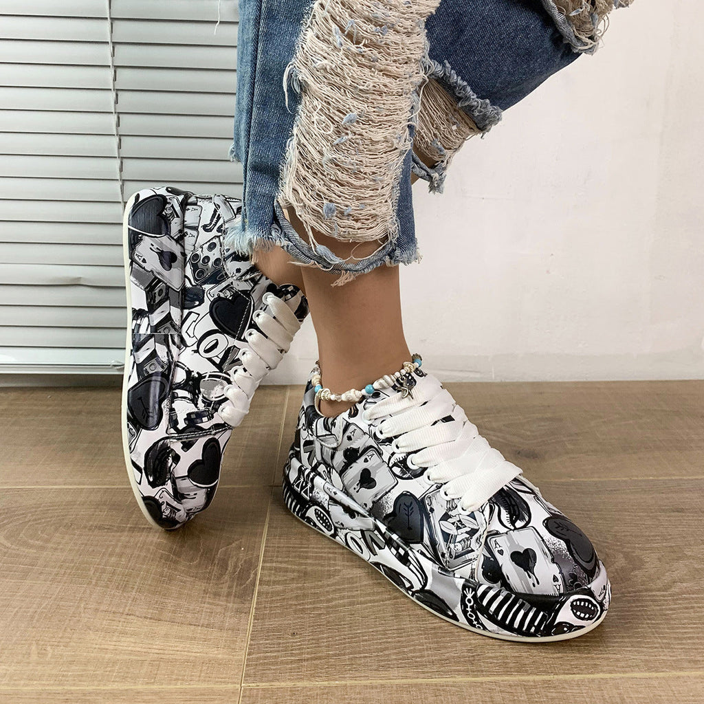 Women’s round-toe thick-sole lace-up sneakers by Plush Fashion Hub featuring casual printed design and durable footwear style.