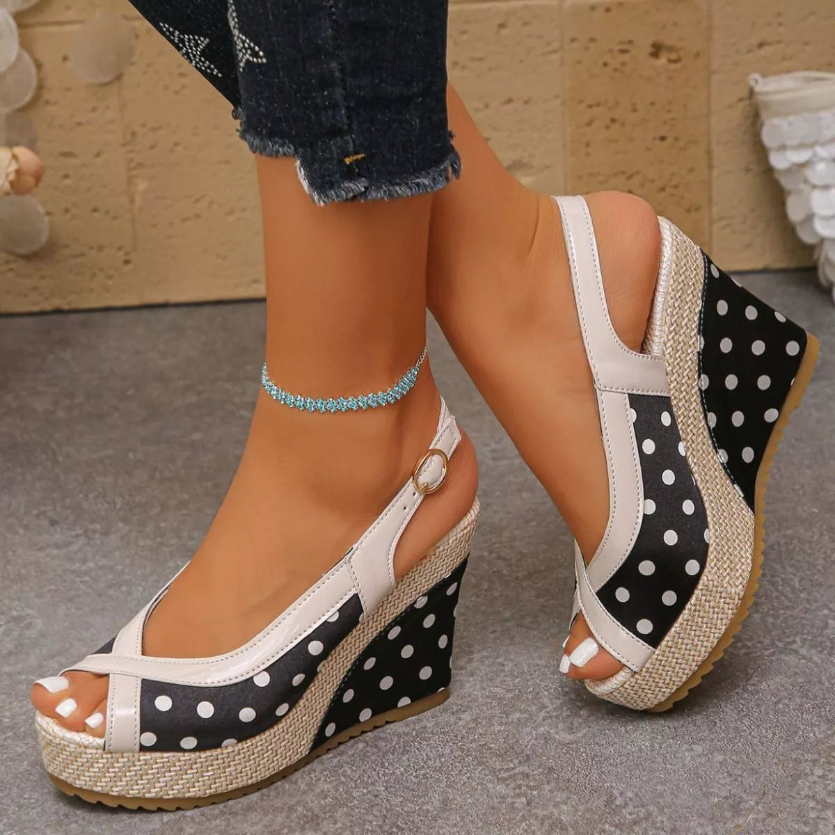 Polka dot peep toe wedge sandals from Trendsi, stylish footwear with a playful pattern and comfortable heel wedge design.