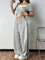 Shopimist tie front short sleeve top and matching pants set, casual outfit with a stylish tie detail and relaxed fit.