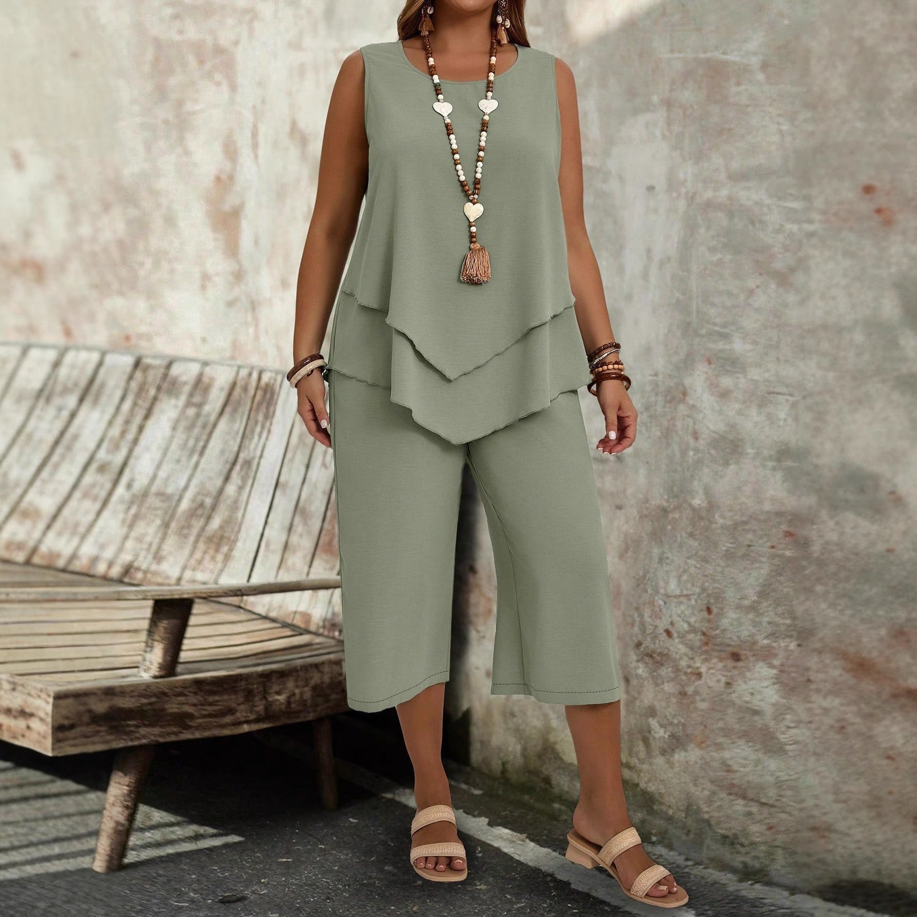 Casual solid-colored sleeveless top and cropped pants two-piece set by Plush Fashion Hub, stylish and comfortable casualwear.