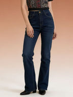 High-waisted bootcut denim jeans from Plush Fashion Shop displayed on a hanger with front and back views.