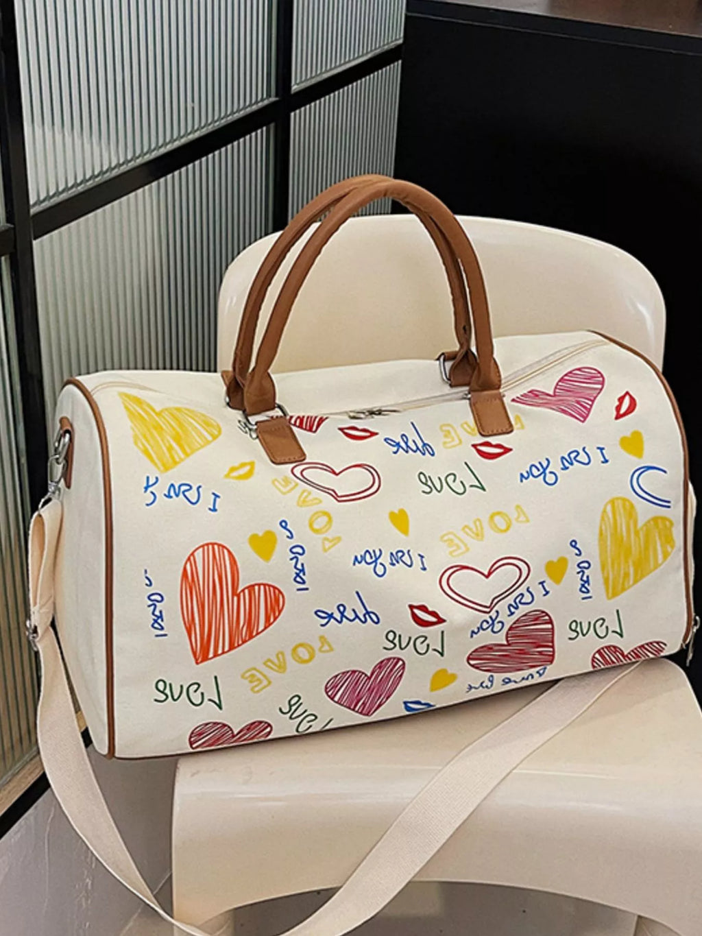 Shopimist printed duffel bag with adjustable strap, featuring a stylish design and spacious interior for travel or gym use.