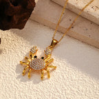 18K gold-plated crab pendant necklace with detailed crab charm hanging from a delicate chain, stylish and elegant jewelry piece.