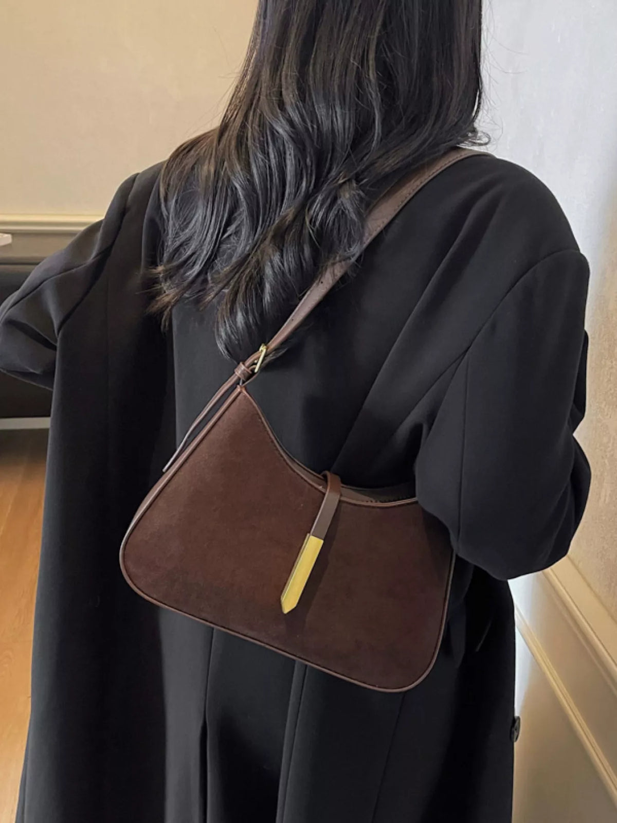 Adjustable strap shoulder bag by Plush Fashion Hub with sleek design and spacious interior, perfect for stylish everyday use.