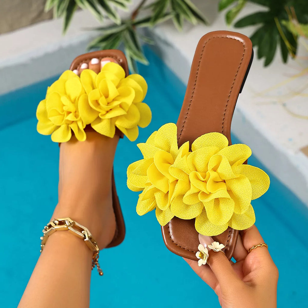 Floral embellished flat sandals from Plush Fashion Hub featuring colorful flower details and comfortable open-toe design