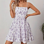 Floral print smocked mini dress by FitiqueFit with spaghetti straps, slim fit, flowy design, perfect for casualwear.