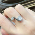 Sterling silver ring with 1.3 carat irregular-shaped moissanite gemstone, stylish jewelry accessory.