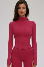 Fitglutes Activewear 3-piece set featuring a kinetic zip jacket, cross-back sports bra, and leggings for workout comfort.