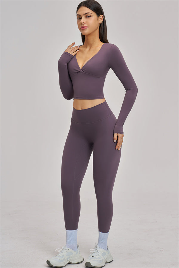 Fitglutes Activewear long sleeve crop top with a fitted design, shown in a stylish, comfortable fabric suitable for gym and workout sessions.