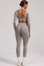 Fitglutes Activewear long sleeve crop top and leggings 2-piece set, athletic gymwear with stylish fit and comfortable fabric.