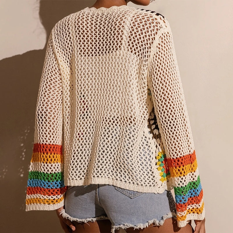 Women's elegant crochet cardigan by FitiqueFit featuring intricate knit details and a stylish, lightweight design.