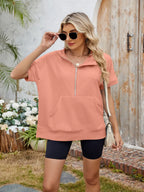 Light gray half zip short sleeve hooded top from Trendsi, featuring a comfortable fit and casual style.