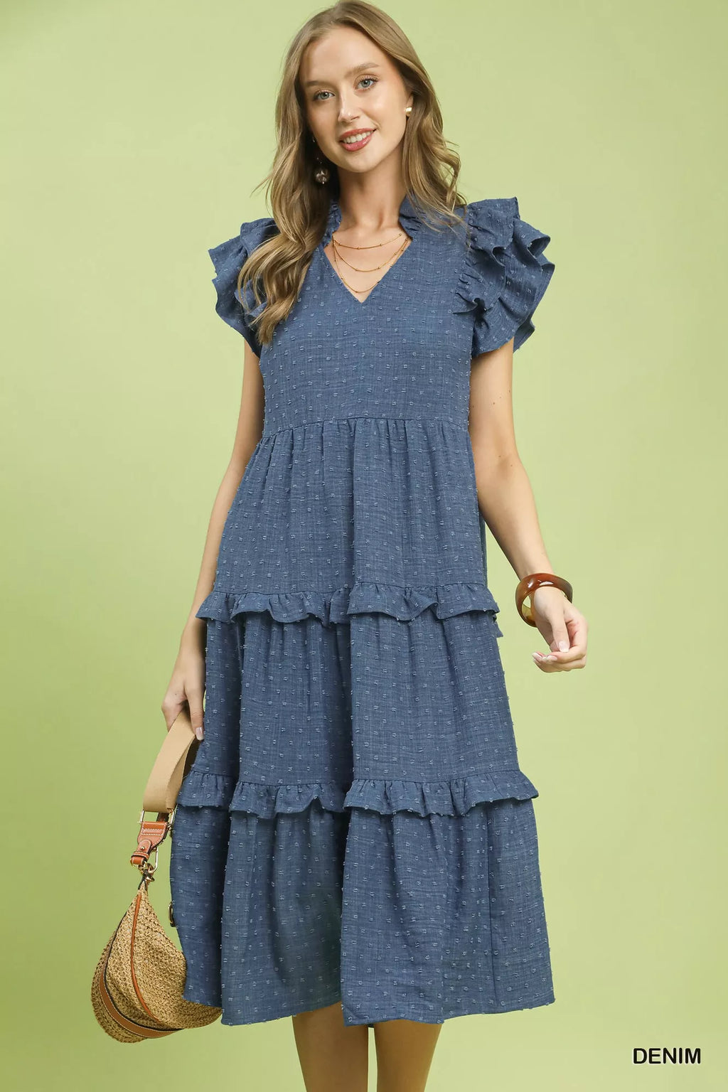 Textured ruffle sleeve tiered midi dress by Umgee, featuring a flowing silhouette and stylish design, shown on a model.