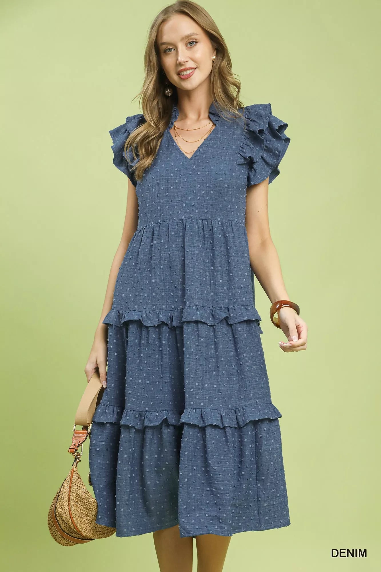 Textured ruffle sleeve tiered midi dress by Umgee, featuring a flowing silhouette and stylish design, shown on a model.