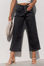 High-waisted button-fly wide-leg jeans from Trendsi, featuring classic denim with a relaxed fit and stylish design.