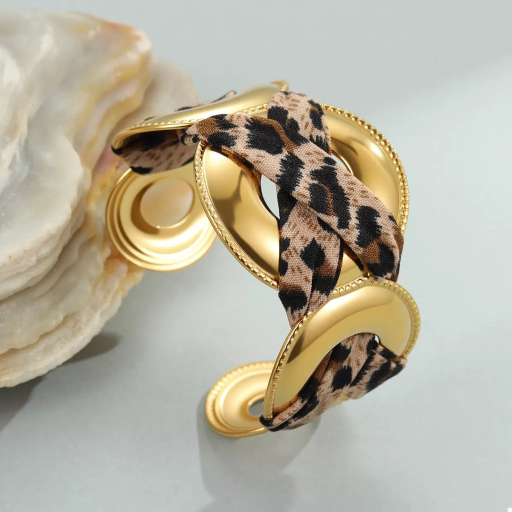 Leopard ribbon 18K gold-plated open bracelet with a sleek design, featuring a stylish animal print pattern.