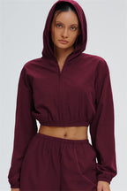 Svelte UV protection crop hoodie by Fitglutes Activewear, featuring a fitted design and sporty style for activewear and workout sessions.
