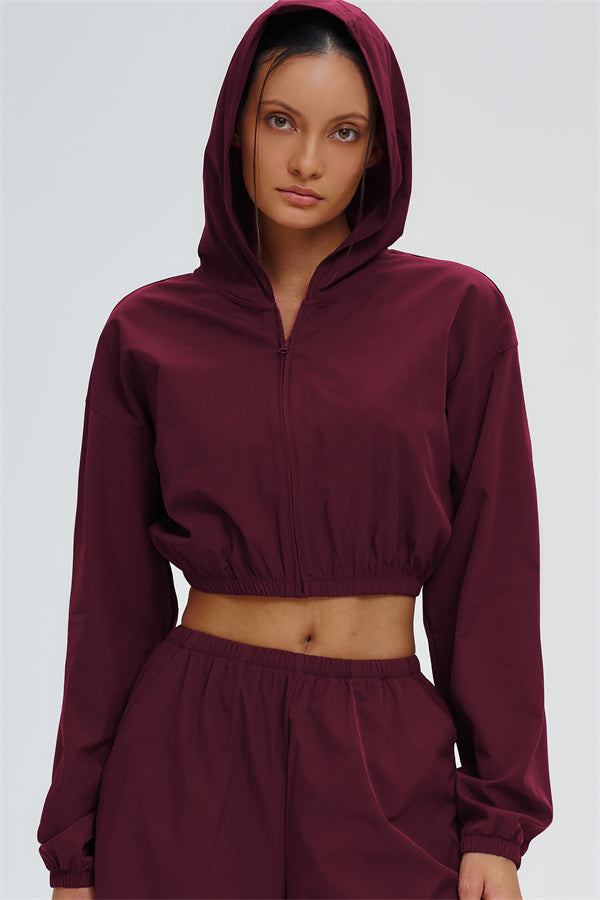 Svelte UV protection crop hoodie by Fitglutes Activewear, featuring a fitted design and sporty style for activewear and workout sessions.