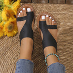 Leather toe loop flats sandals by Shopimist featuring a sleek design with a comfortable slip-on fit and stylish leather straps.