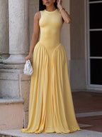 Sleeveless O-neck maxi dress by Trendsi featuring a flowing silhouette and lightweight fabric, perfect for warm weather wear.