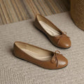 Women's FitiqueFit slip-on flats with egg-roll edge and round toe, inspired by classic Chanel-style footwear.
