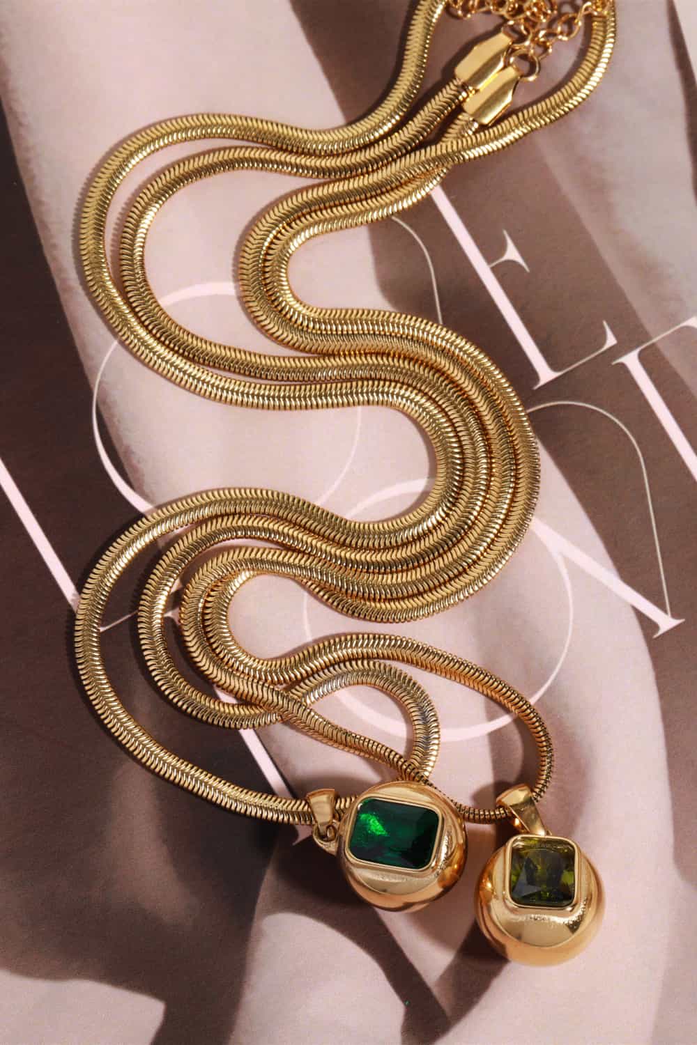 18K gold-plated Zircon geometric pendant necklace with modern design, featuring a sleek, minimalist shape and sparkling zircon accents.
