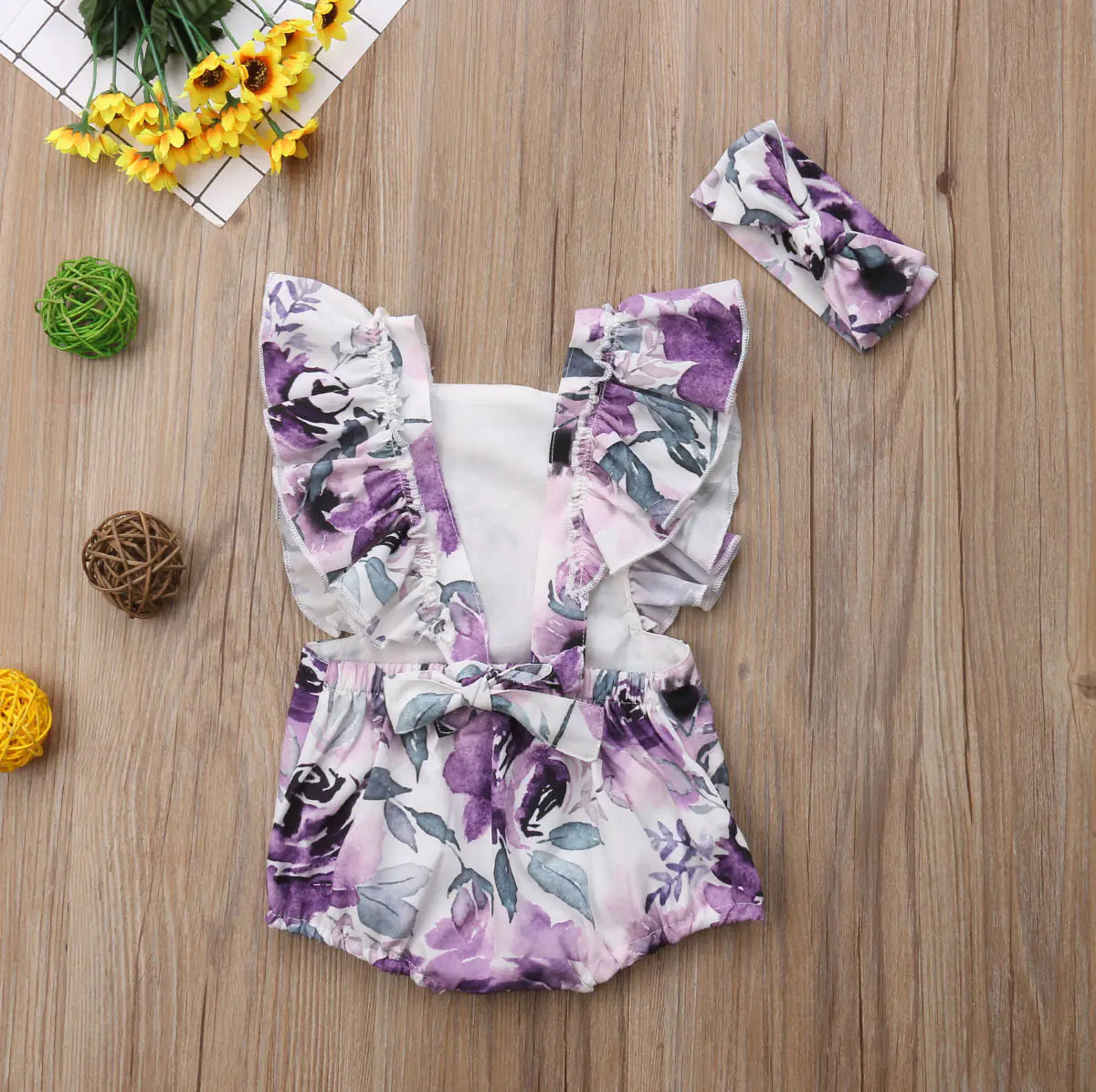 Girls' floral two-piece outfit from Trendy Attic Store01 featuring a back tie top and matching headband, perfect for spring or summer.