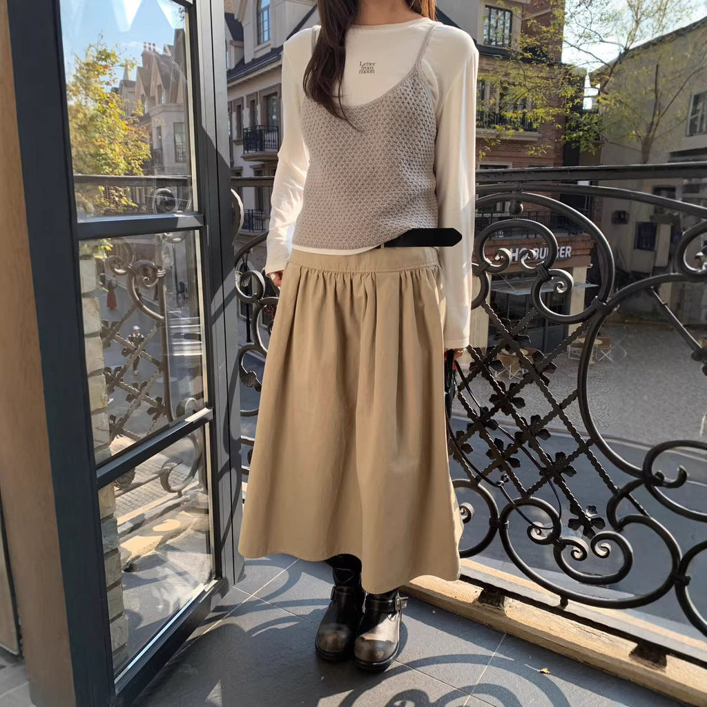 FitiqueFit relaxed A-line cotton midi skirt with crushed pleats and belt, casualwear style, shown with a flowy silhouette and neutral color.