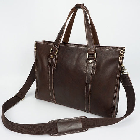 First layer oily cowhide leather shoulder messenger bag with adjustable strap, crafted by Plush Fashion Hub.