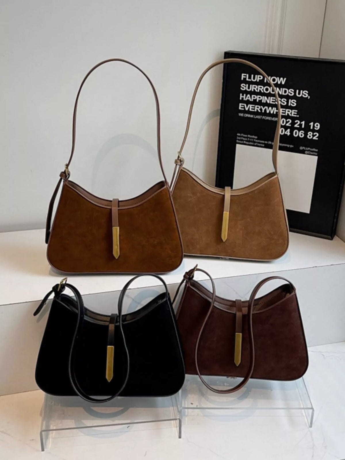 Simply Love adjustable strap shoulder bag with a sleek, modern design, featuring a smooth surface and versatile style.