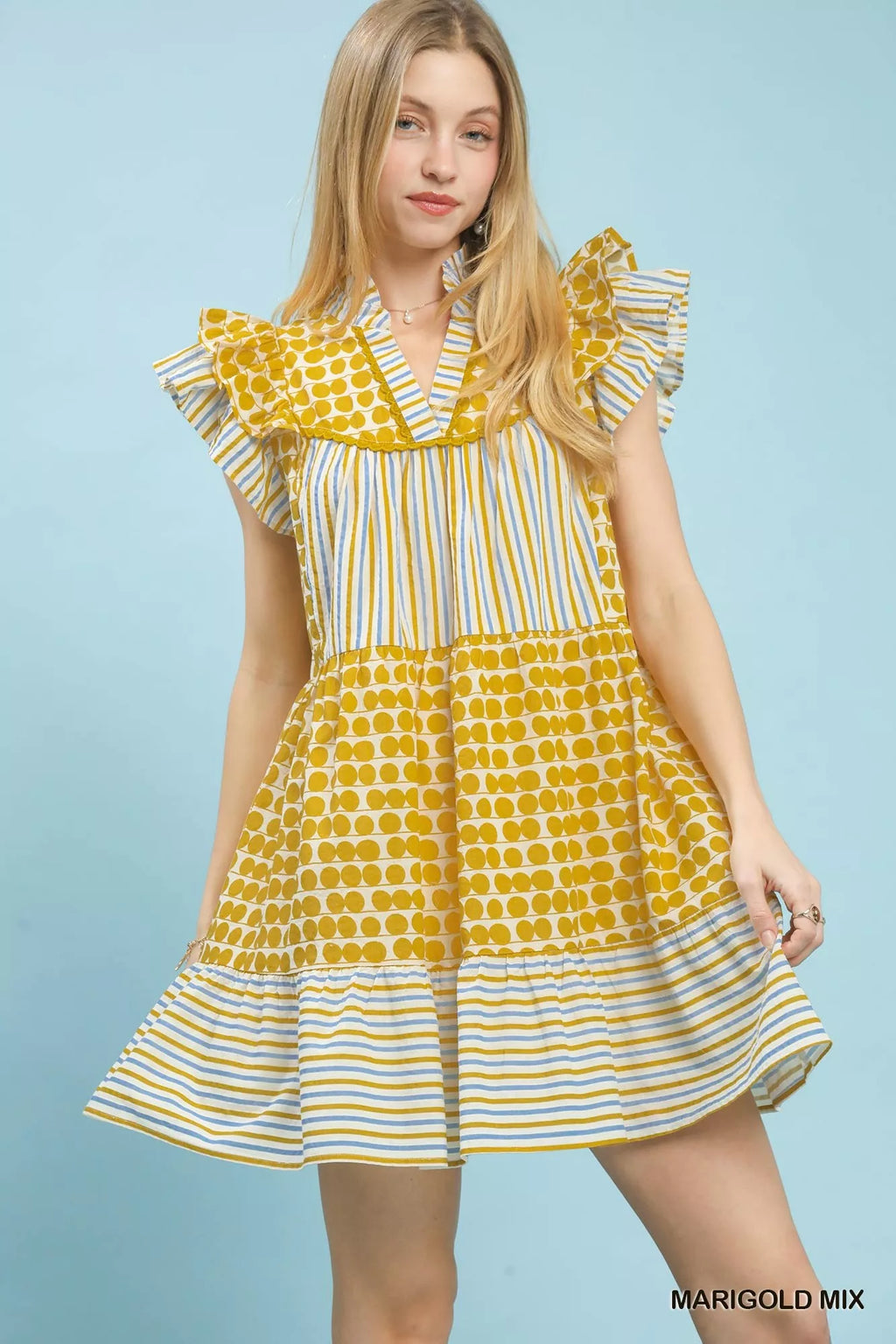 Umgee Mix Patchwork Flutter Sleeve Tiered Dress, featuring colorful patchwork design and flowy tiered skirt with flutter sleeves.