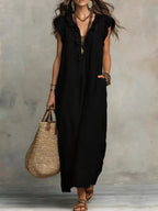 Plush Fashion Hub ruffled v-neck maxi dress in flowing fabric with tiered layers and adjustable straps, perfect for summer wear.