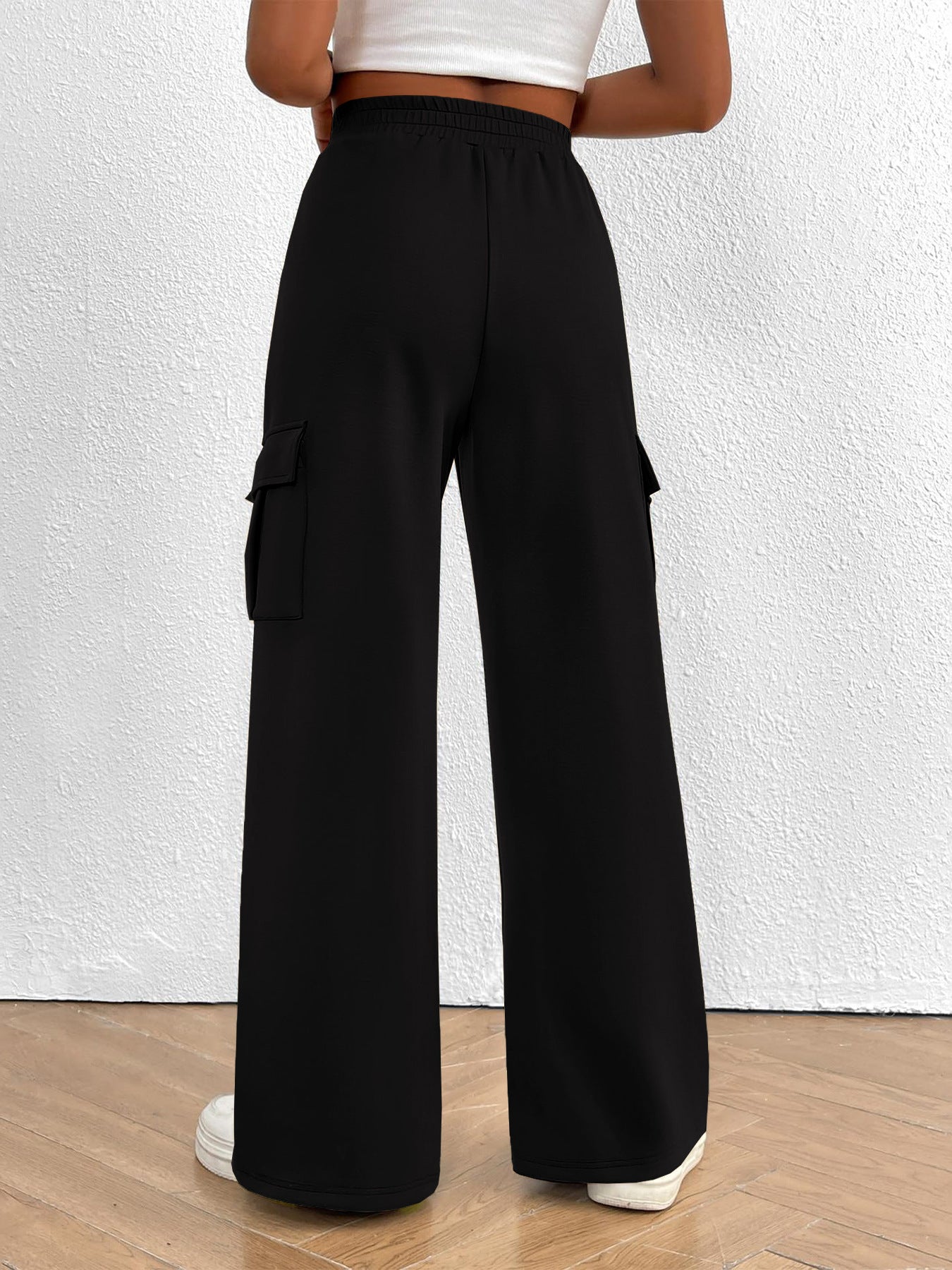 Women's high-waisted casual cargo pants with drawstring, lightweight utility pants in neutral fabric, by Trendsi.