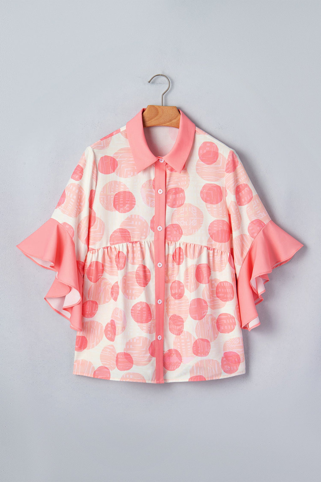 Angelica short sleeve babydoll blouse by Threaded Pear, featuring a flowy fit and lightweight fabric, ideal for casual wear.
