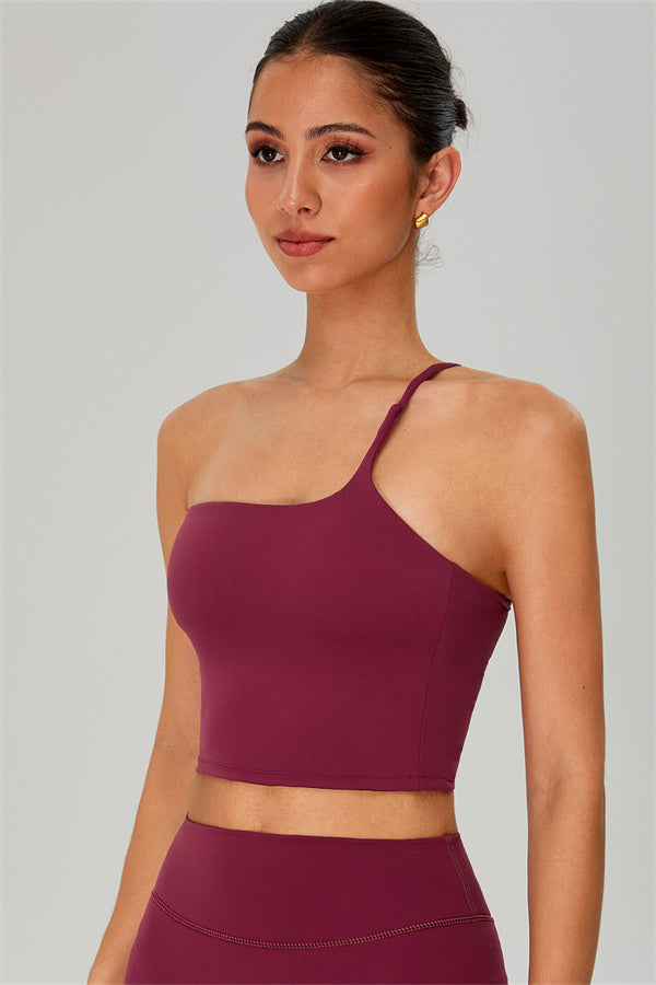 Fitglutes activewear one-shoulder crop top and shorts 2-piece set, stylish gymwear and workout clothes for women.