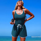 Women's minimalist FitiqueFit sleeveless one-piece swimsuit in solid color, designed for sporty and sleek swimwear style.
