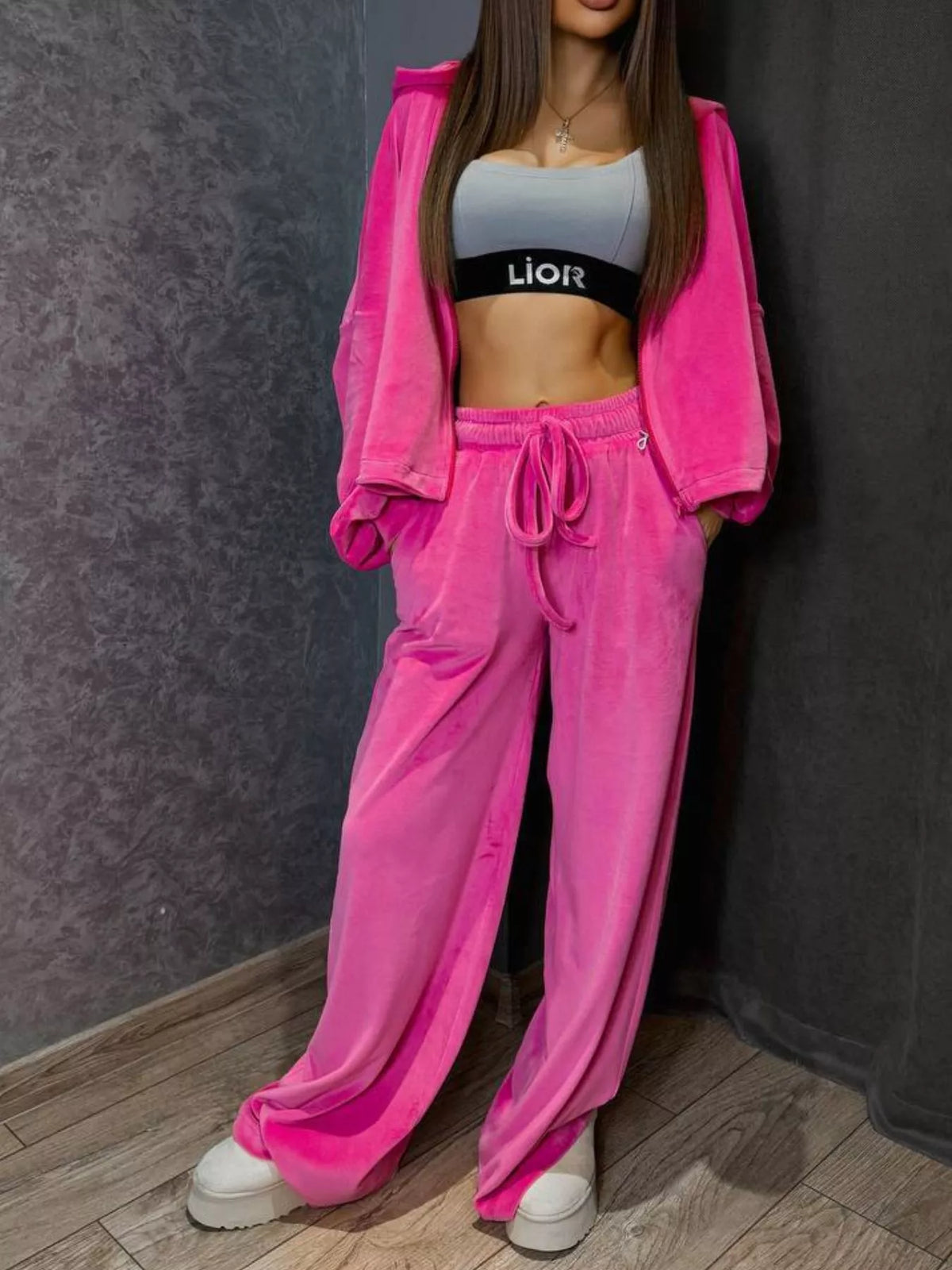 Plush Fashion Hub zip-up cropped outerwear and matching pants set, featuring a stylish, coordinated look in soft fabric.