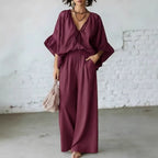 Women’s casual two-piece set with loose-fit V-neck top and wide-leg pants by FitiqueFit, shown in a comfortable, relaxed fit.