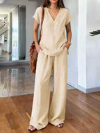 Plus size Trendsi loungewear set with a V-neck short sleeve top and matching pants, comfortable and stylish for relaxed wear.