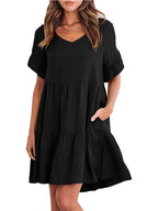 Lightweight rayon ruffled sleeve tiered mini dress with pockets, stylish and feminine, in a vibrant color, perfect for casual wear.