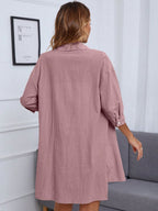 Women's casual button-up shirt and shorts two-piece set by Trendsi, featuring a stylish, relaxed fit with breathable fabric.