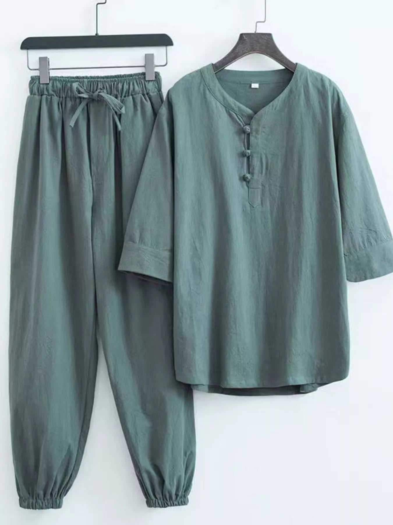 Plus size men's Chinese style top and pants set by Shopimist, featuring traditional design and comfortable fit.