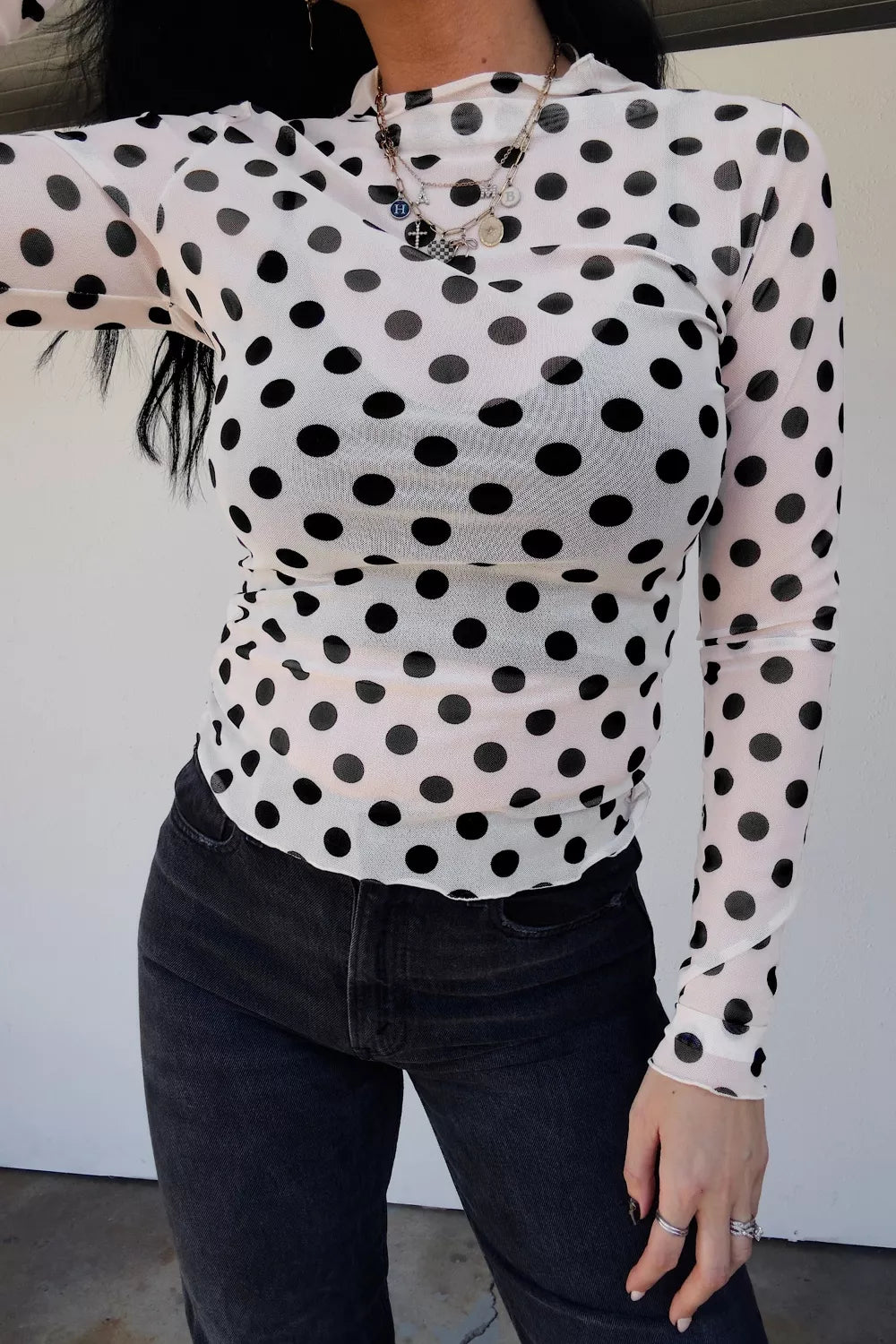 Polka dot mesh long sleeve sheath top with stand neck in black and white, by Plush Fashion Hub.