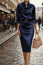 Women's slim-fit midi dress with lapel collar and half-sleeves from Plush Fashion Hub, casualwear style displayed in the image.